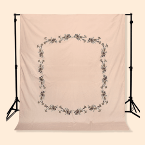peach bedsheet with flower print in the middle