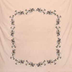peach bedsheet with flower print in the middle